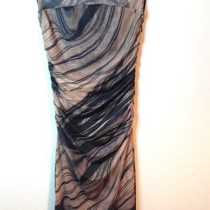 Commense Sleeveless high collar midi dress.